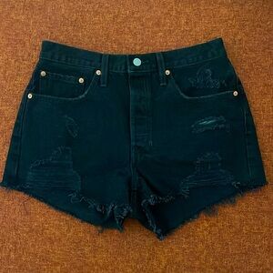 Levi’s women’s black 501 distressed shorts